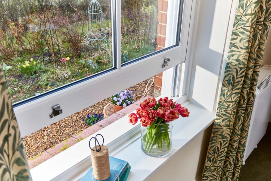 White uPVC Sliding Sash Window with Cottage Bars
