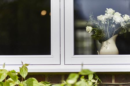 Close up of double glazed timber flush casement window in White from the Anglian wooden window range