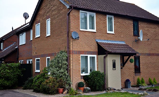 White UPVC double glazed casement windows with blinds semi-detached house renovation from Anglian Home Improvements