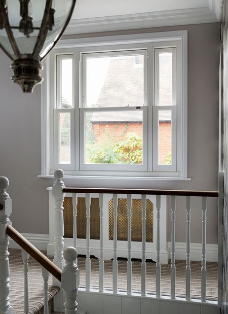 Elite vertical sliding sash window in White Knight uPVC