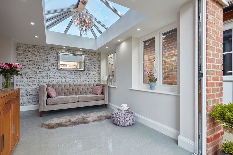 Contemporary orangery extension with roof lantern and UPVC casement windows from the Anglian modern conservatory range