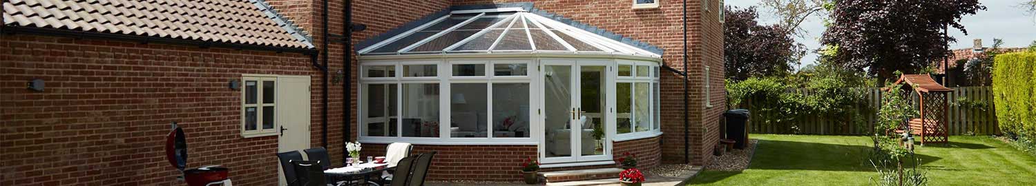 white woodgrain victorian conservatory in upvc