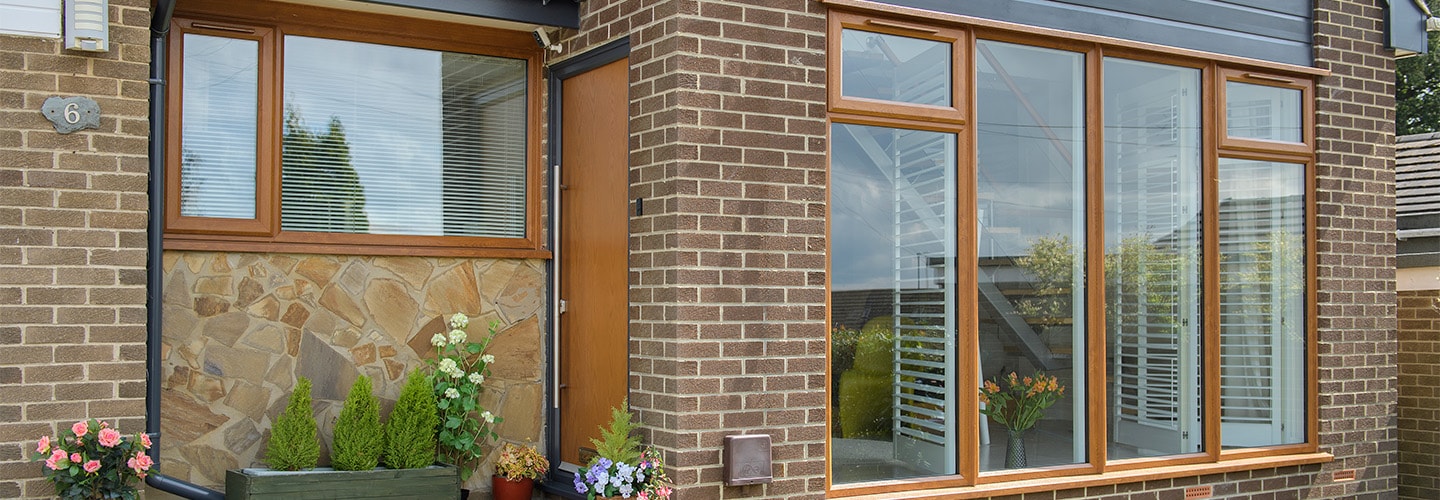 Golden oak composite front door and windows secondary banner
