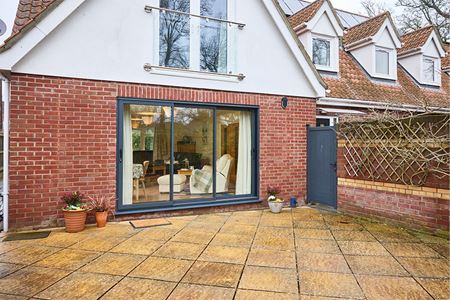 Anthracite grey aluminium sliding patio door exterior