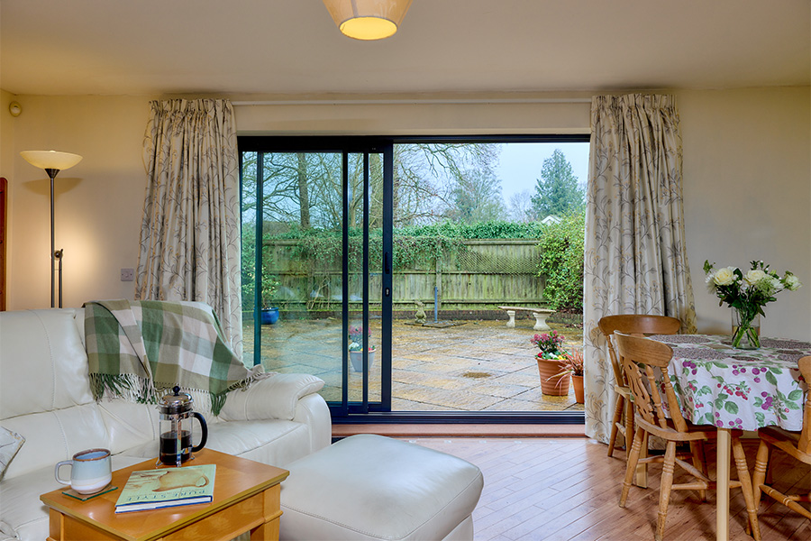 Anthracite grey aluminium sliding patio door interior in open position