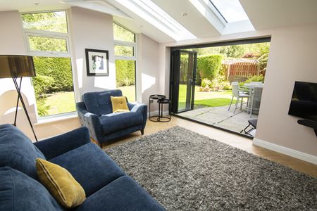 Extension with Dual Dark Woodgrain French doors