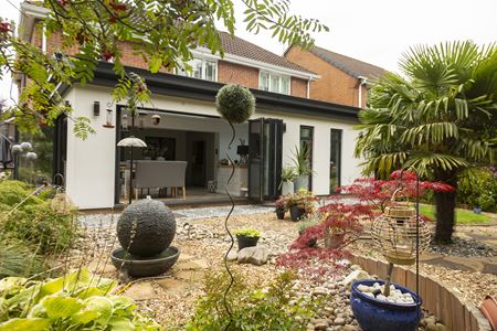 Extension with Dual Dark Woodgrain French doors