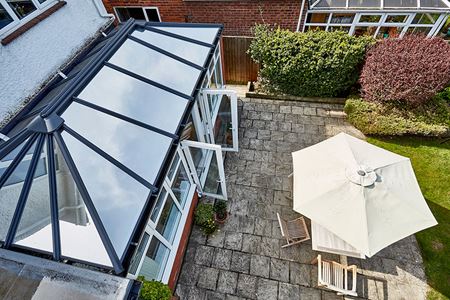 Anthracite grey Edwardian conservatory with solarglass replacement roof