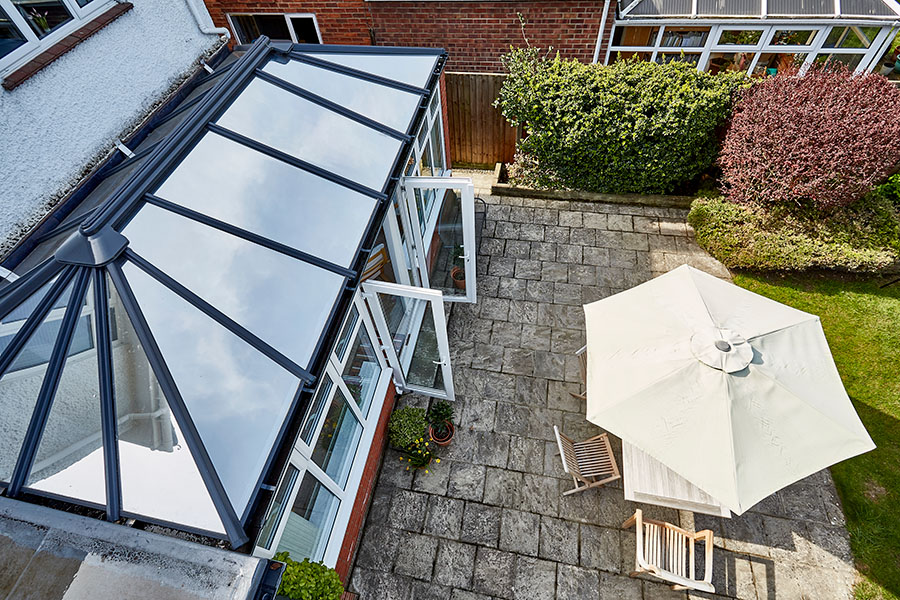 Anthracite grey Edwardian conservatory with solarglass replacement roof