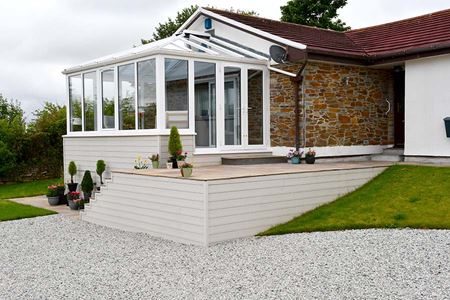 White uPVC Elizabethan conservatory with solar roof