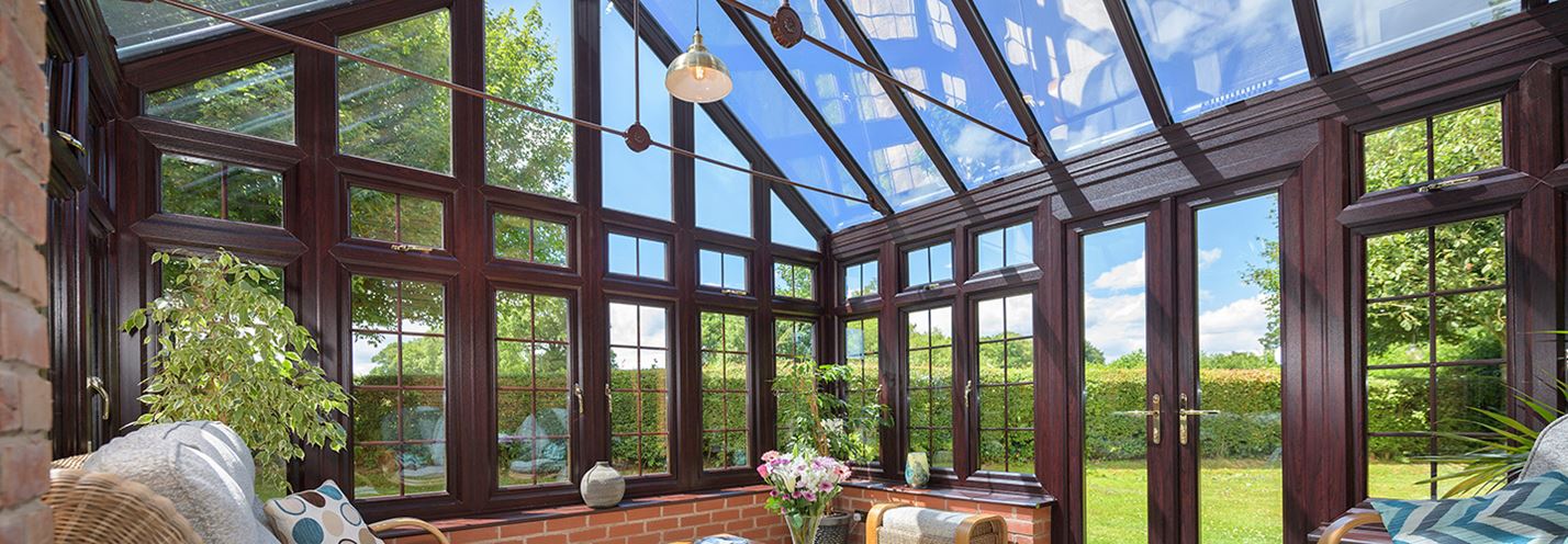 Dark woodgrain Regency conservatory interior banner