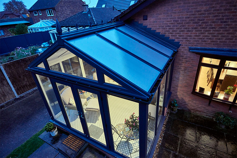 Dual Anthracite grey Regency conservatory with polycarbonate roof