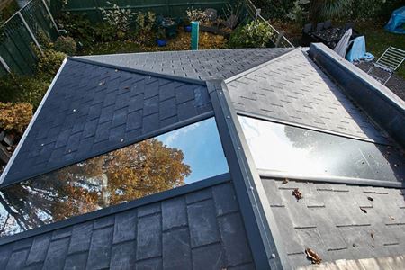CosyRoom Extension with black aluminium Bifold Doors