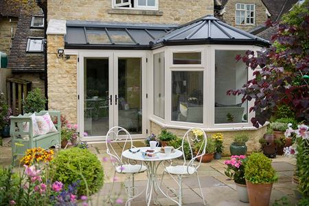 Solid panel extension with dual cream uPVC French doors