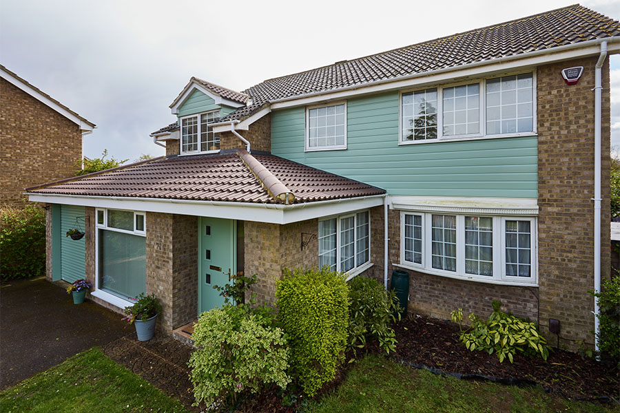 Sage green uPVC shiplap cladding whole house