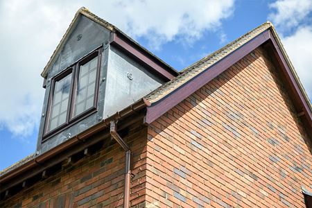Brown uPVC fascias and soffits brown guttering