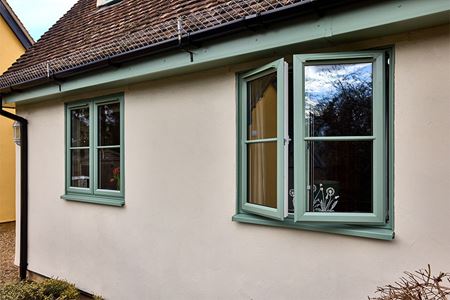 Sage green uPVC fascias and soffit with french windows