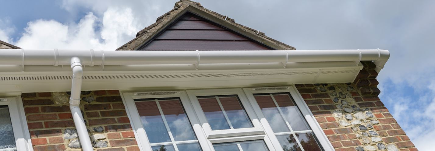 White uPVC soffits and fascias guttering secondary banner