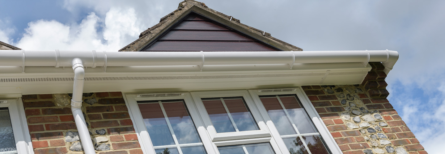 White uPVC soffits and fascias guttering secondary banner