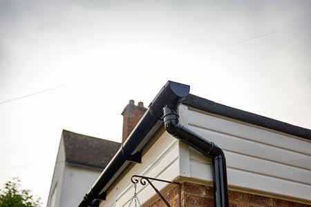 Black Deepflow guttering and downpipe