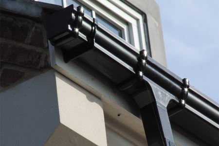Black uPVC Ogee guttering close up