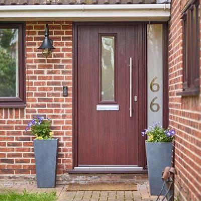 Dark woodgrain elite composite door with Negative etched glass number