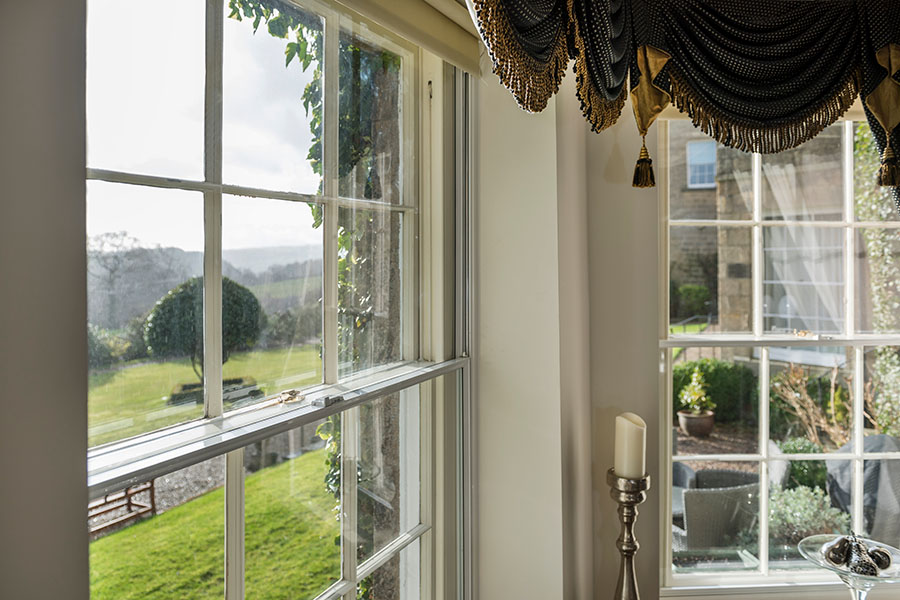 Wood sliding sash window with secondary glazing after