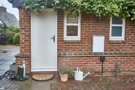 Cream uPVC casement windows with matching door