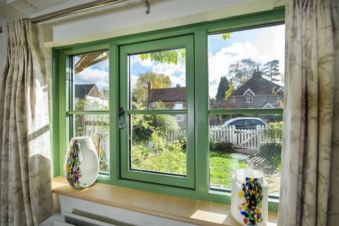 Timber flush casement window interior with Georgian insert bars Olive Green