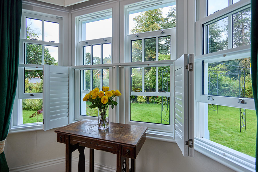White timber sliding sash spiral balance windows